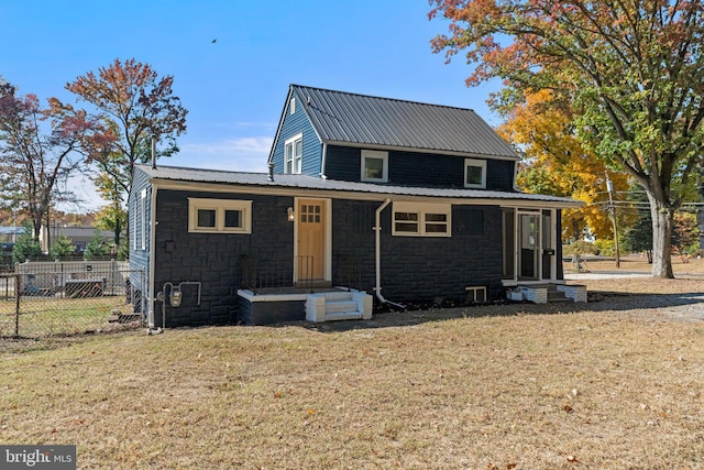 view of front of home with a front lawn