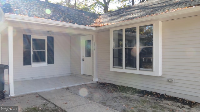 doorway to property featuring a patio