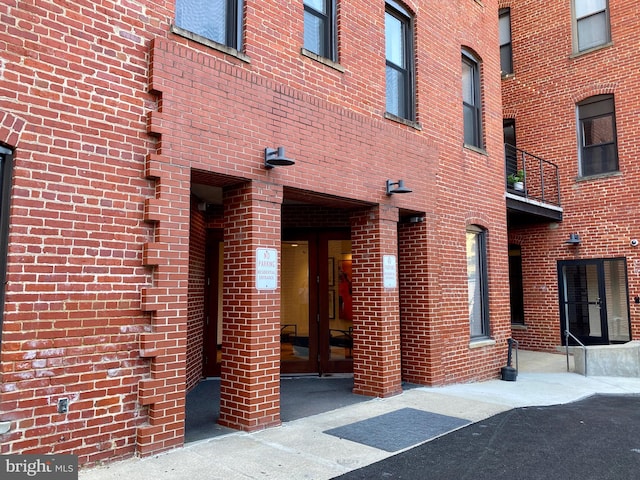 doorway to property featuring french doors and a balcony