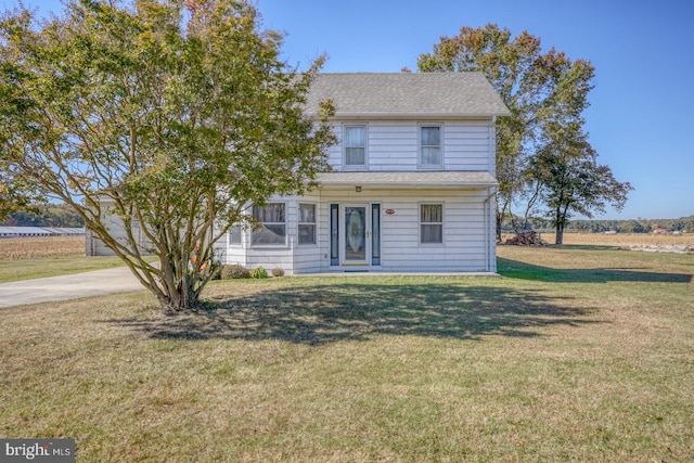 view of front of house with a front yard