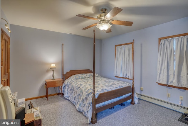 bedroom with a baseboard radiator, carpet floors, and ceiling fan