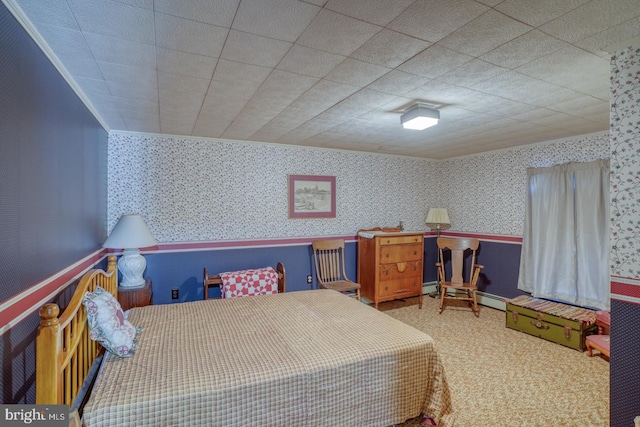 carpeted bedroom with a baseboard radiator