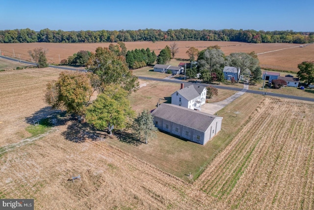 birds eye view of property featuring a rural view