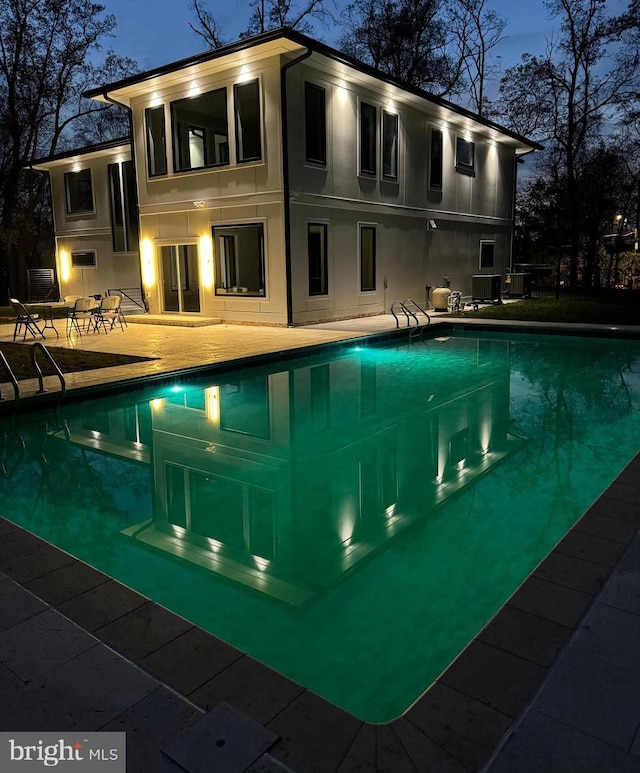 5005 Ravensworth Rd, Annandale, VA 22003 - swimming pool featuring a patio and central air condition unit