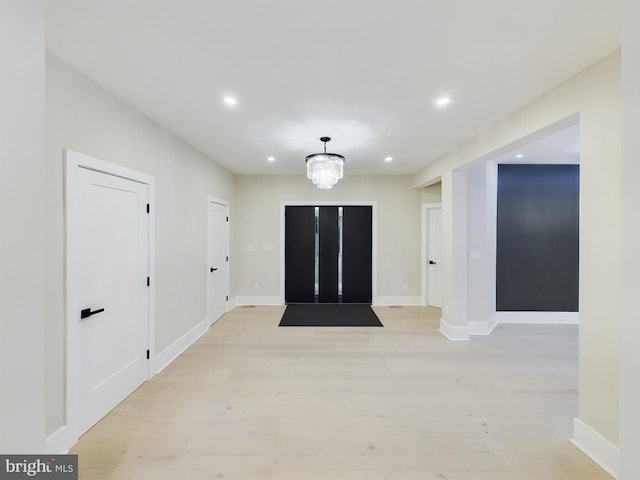 5005 Ravensworth Rd, Annandale, VA 22003 - foyer featuring light wood-style floors, recessed lighting, and baseboards