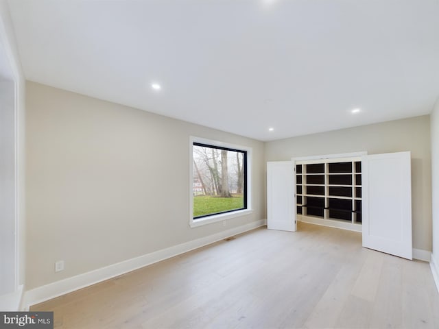 5005 Ravensworth Rd, Annandale, VA 22003 - empty room with light wood-style floors, recessed lighting, and baseboards