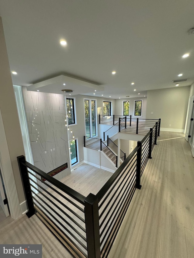 staircase featuring hardwood / wood-style floors