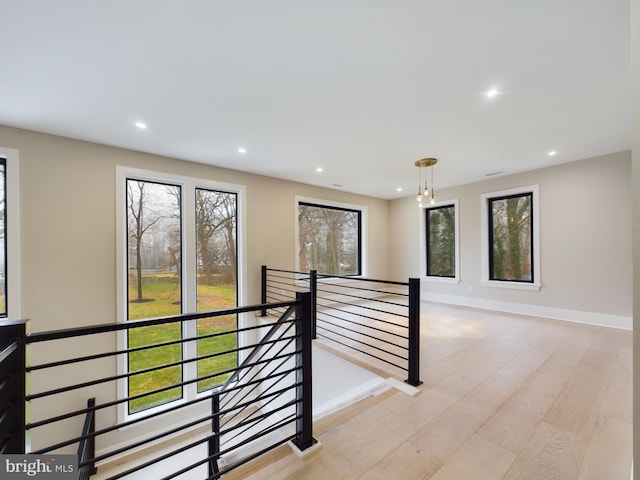 5005 Ravensworth Rd, Annandale, VA 22003 - hallway featuring an upstairs landing, recessed lighting, baseboards, and light wood-style flooring