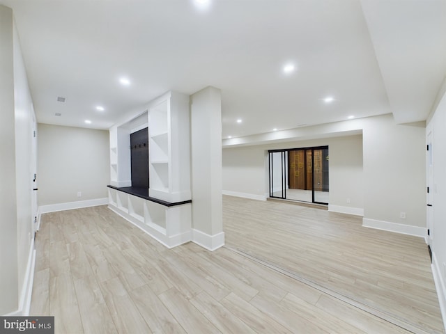 unfurnished living room with light hardwood / wood-style floors