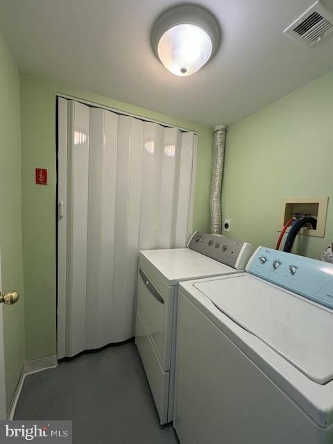 laundry area featuring independent washer and dryer