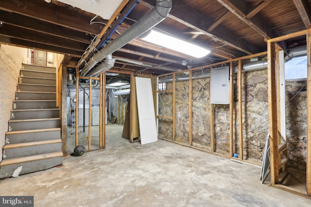 basement with washer / dryer and electric panel