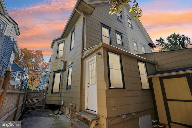 view of property exterior at dusk