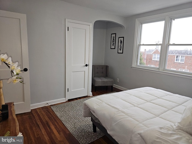 bedroom with wood-type flooring