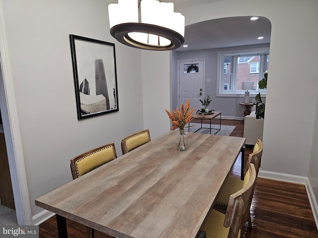 dining room featuring dark hardwood / wood-style flooring