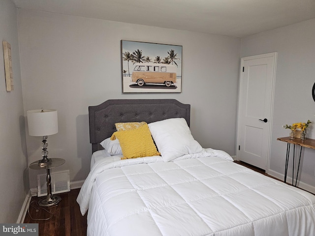 bedroom featuring hardwood / wood-style floors