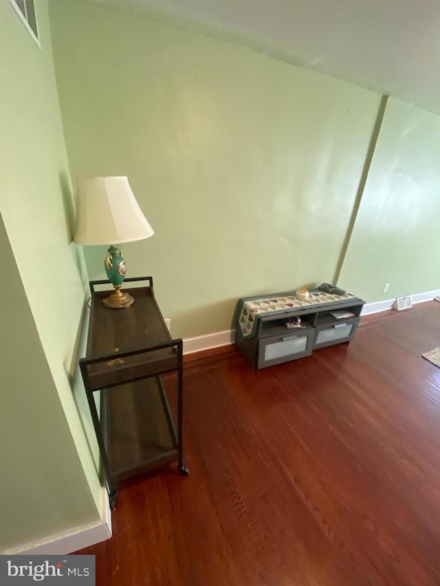 interior space with dark hardwood / wood-style floors