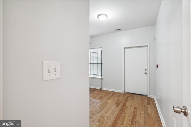 hall featuring light hardwood / wood-style flooring