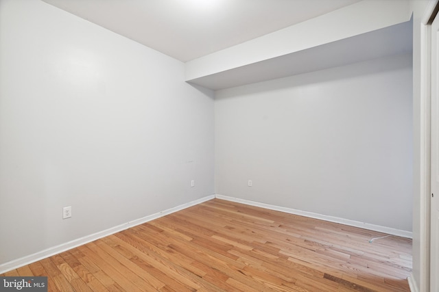 unfurnished room featuring light wood-type flooring