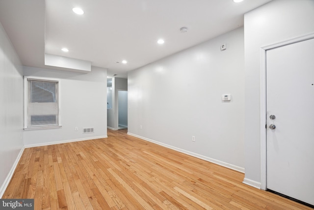 basement featuring light hardwood / wood-style floors