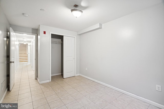 unfurnished bedroom with a closet