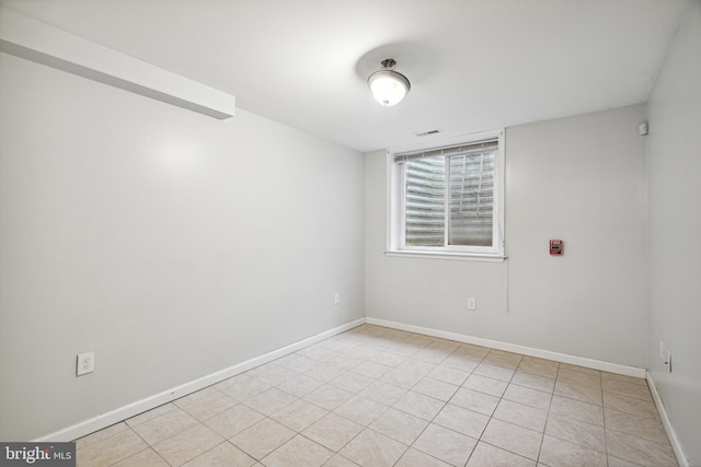 view of tiled spare room