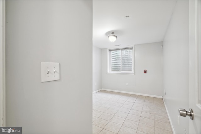 view of tiled spare room