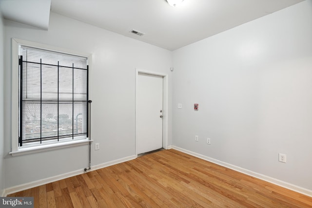 unfurnished room featuring light wood-type flooring