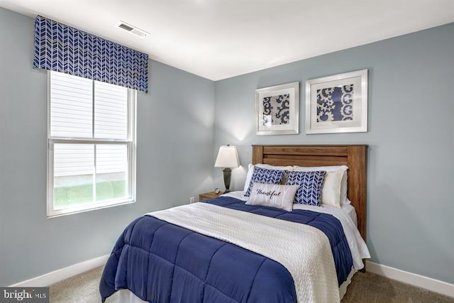 bedroom featuring carpet