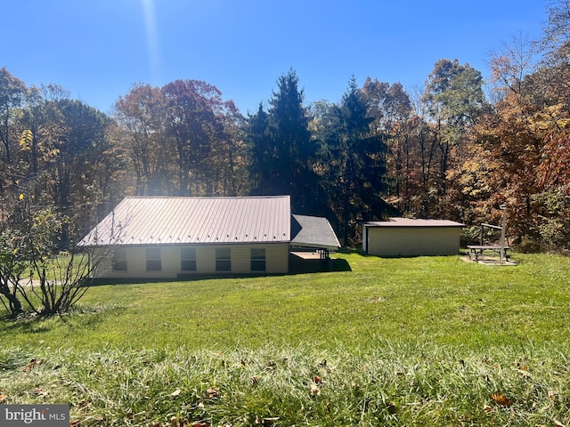 view of property exterior featuring a lawn