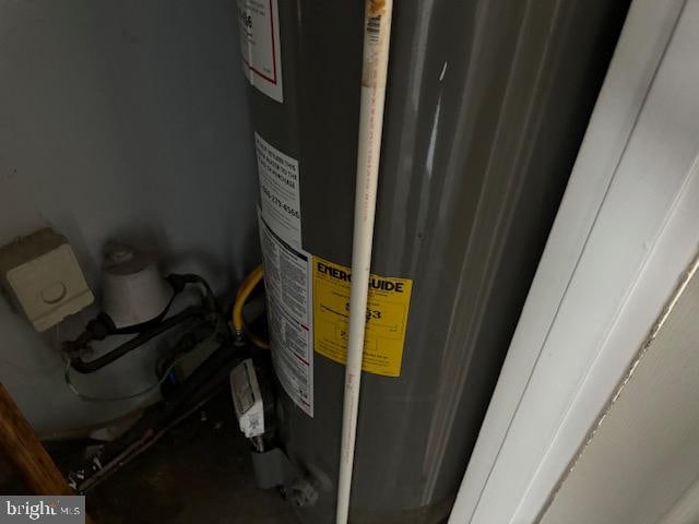 utility room featuring gas water heater