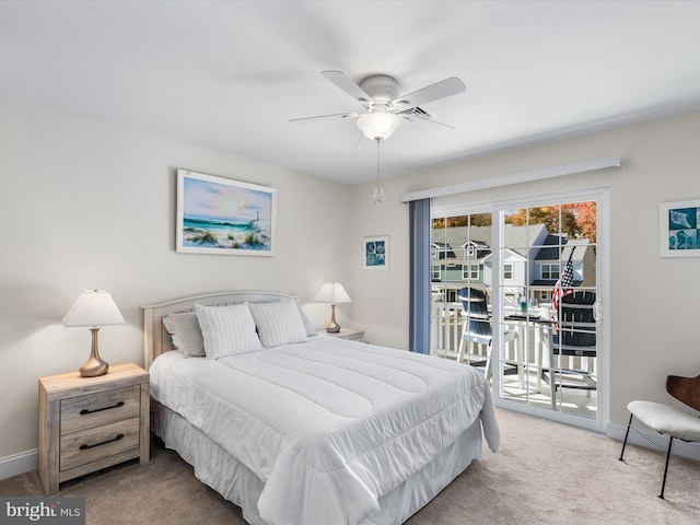 carpeted bedroom featuring access to outside and ceiling fan