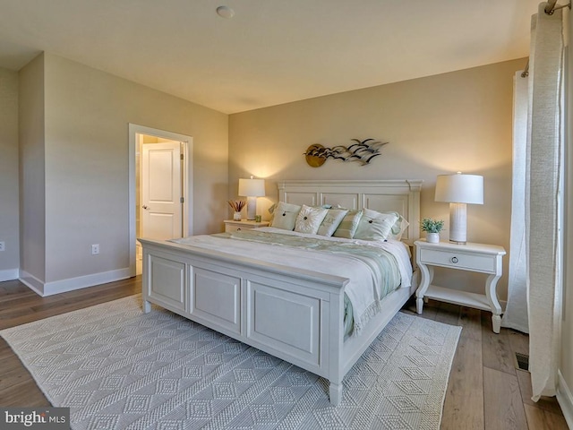 bedroom featuring light wood-type flooring