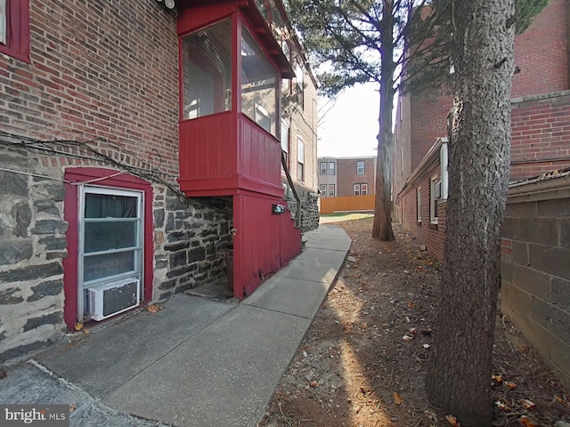 view of property exterior with cooling unit