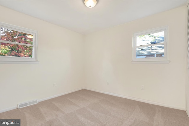 view of carpeted spare room