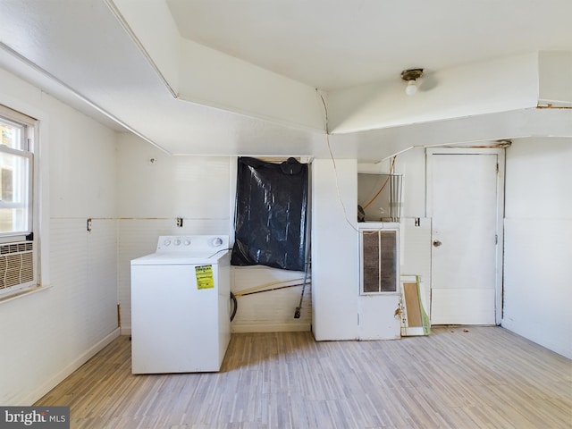 washroom with washer / dryer and light hardwood / wood-style flooring