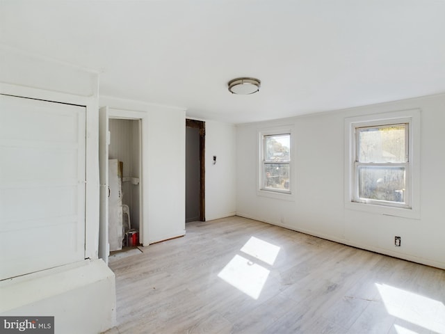 unfurnished bedroom with light hardwood / wood-style flooring