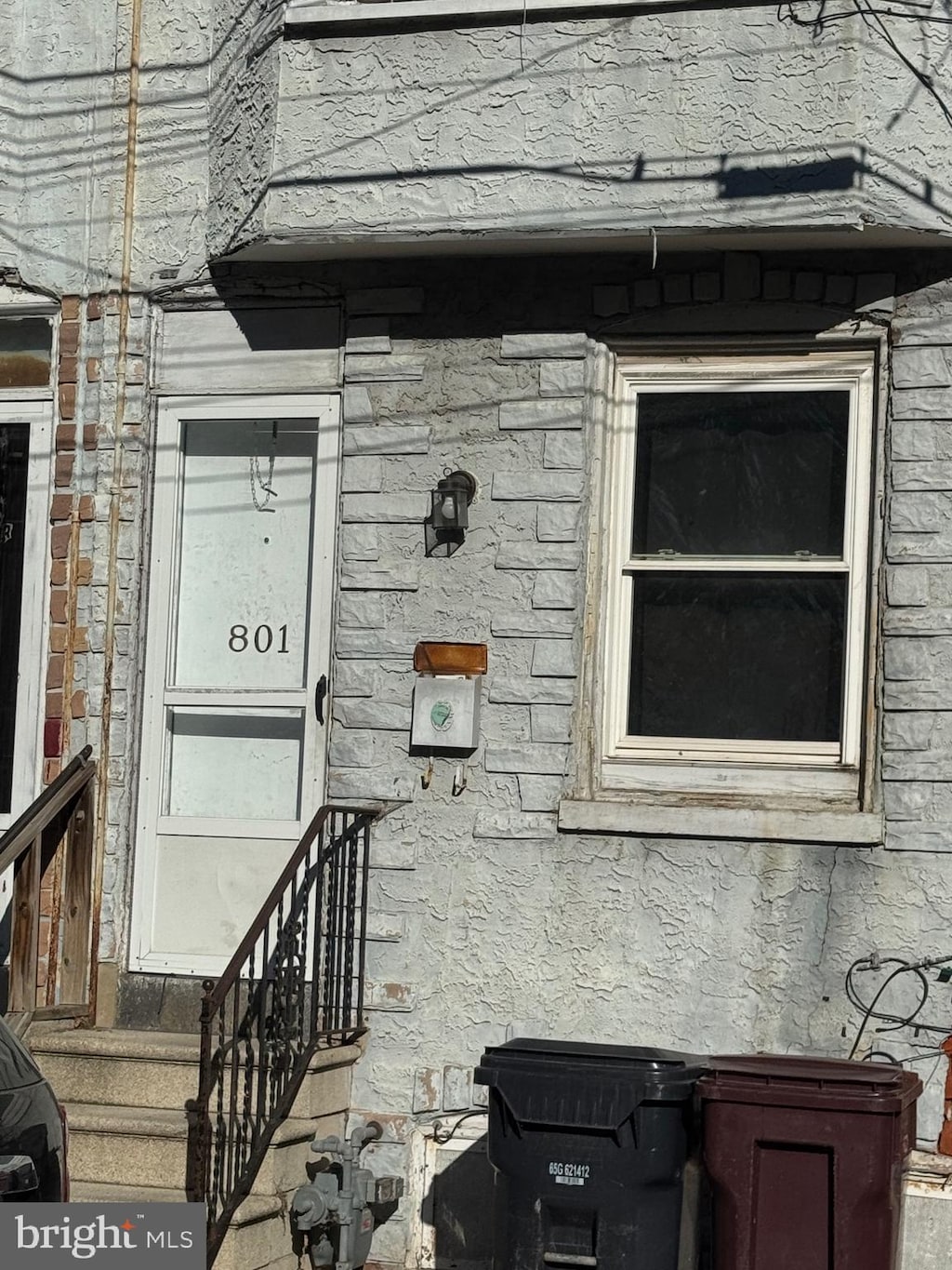 801 Wright St, Wilmington, DE 19805 - view of exterior entry featuring stone siding
