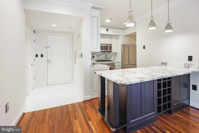 kitchen featuring kitchen peninsula, white cabinetry, stainless steel appliances, and dark wood-type flooring