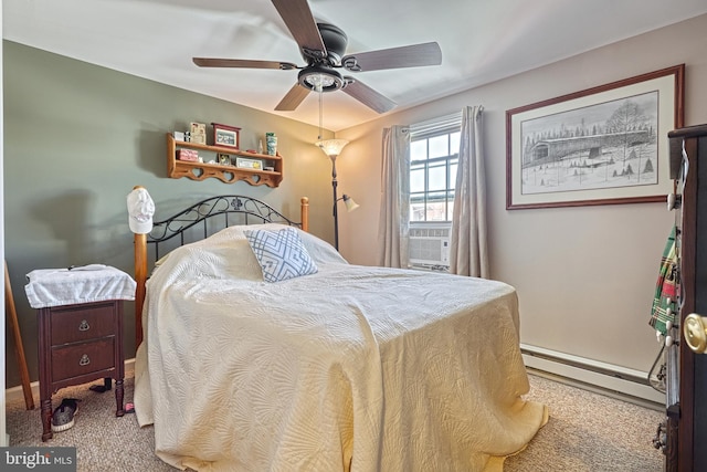 carpeted bedroom with ceiling fan, cooling unit, and baseboard heating