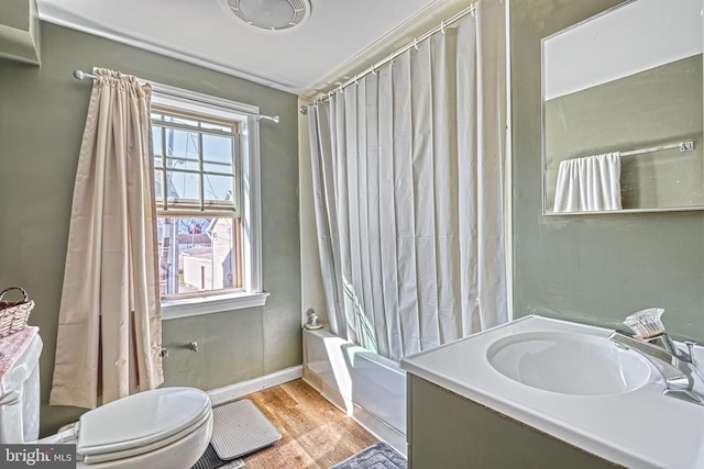 full bathroom with vanity, toilet, shower / bath combo, and hardwood / wood-style floors