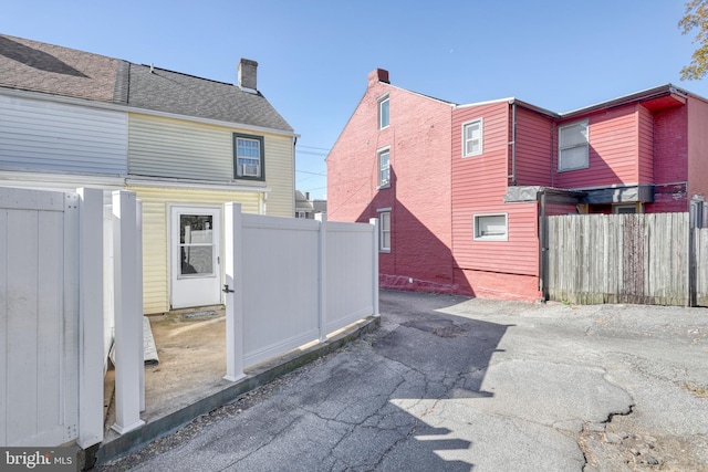 back of property featuring a patio area