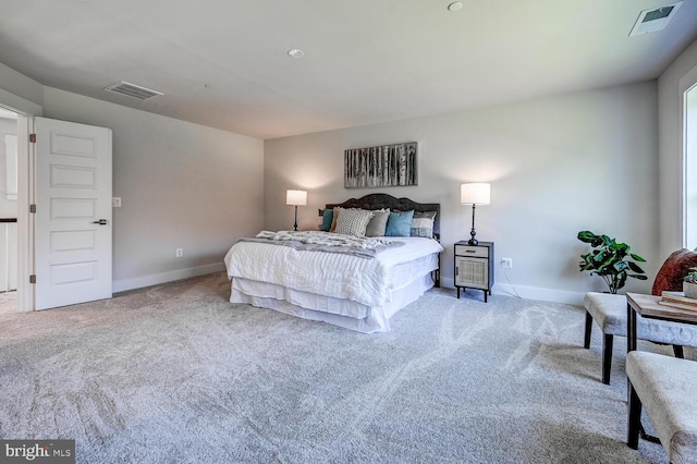 bedroom with light carpet