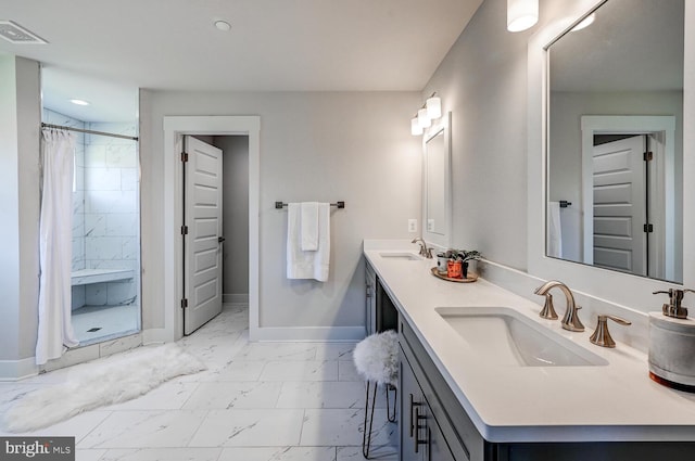 bathroom with vanity and curtained shower