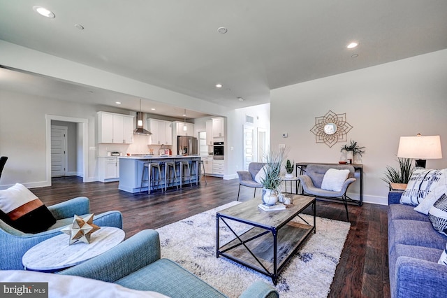 living room featuring dark hardwood / wood-style flooring