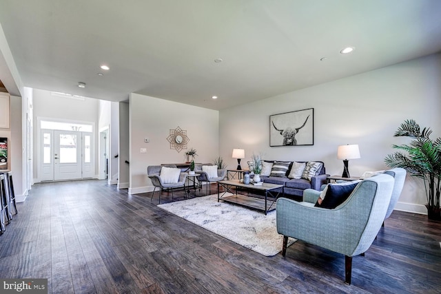 living room featuring dark hardwood / wood-style floors