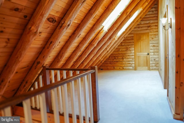 bonus room with vaulted ceiling with beams, log walls, and wooden ceiling