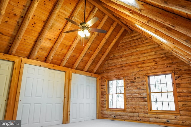 unfurnished bedroom with rustic walls, beamed ceiling, wooden ceiling, and high vaulted ceiling