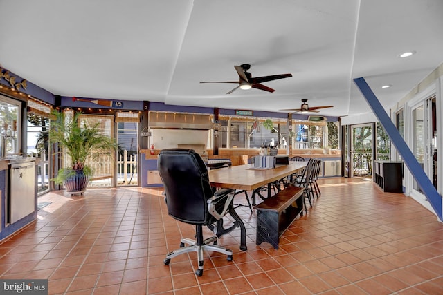 dining room with light tile patterned flooring and ceiling fan