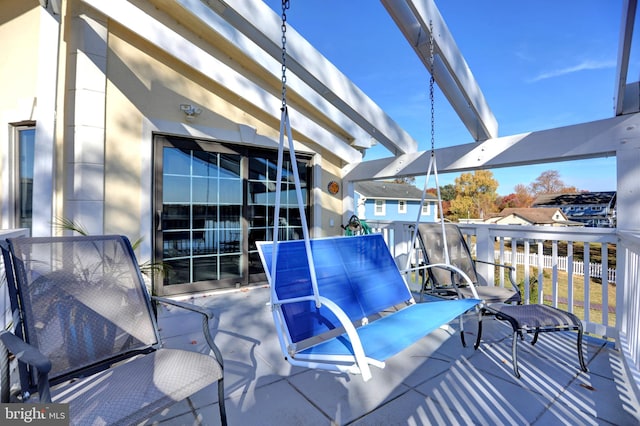 view of patio featuring a pergola