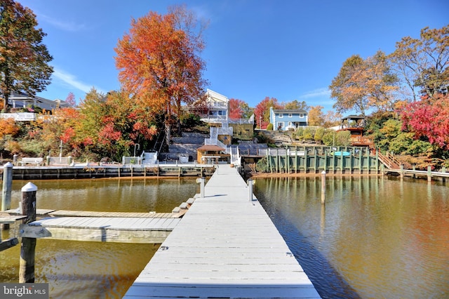 view of dock with a water view